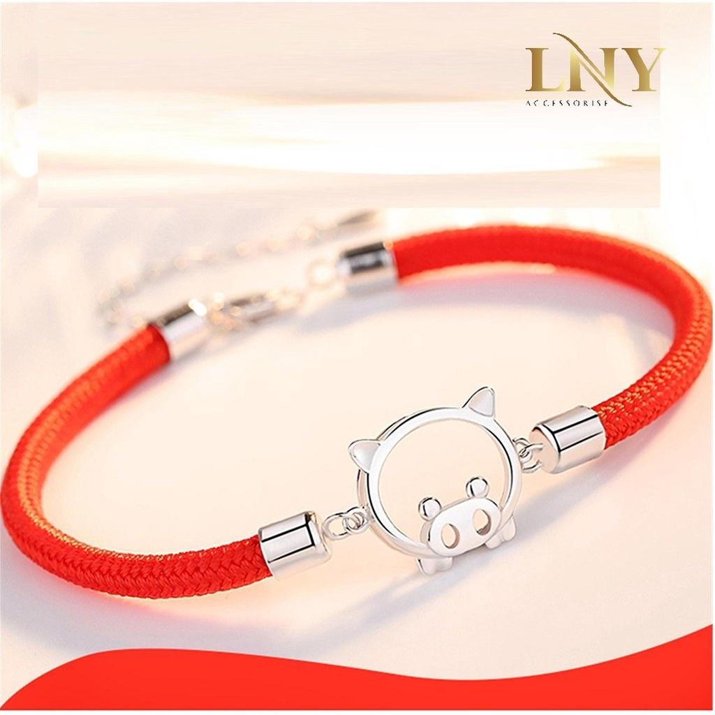 Vòng tay chỉ đỏ hình heo con may mắn