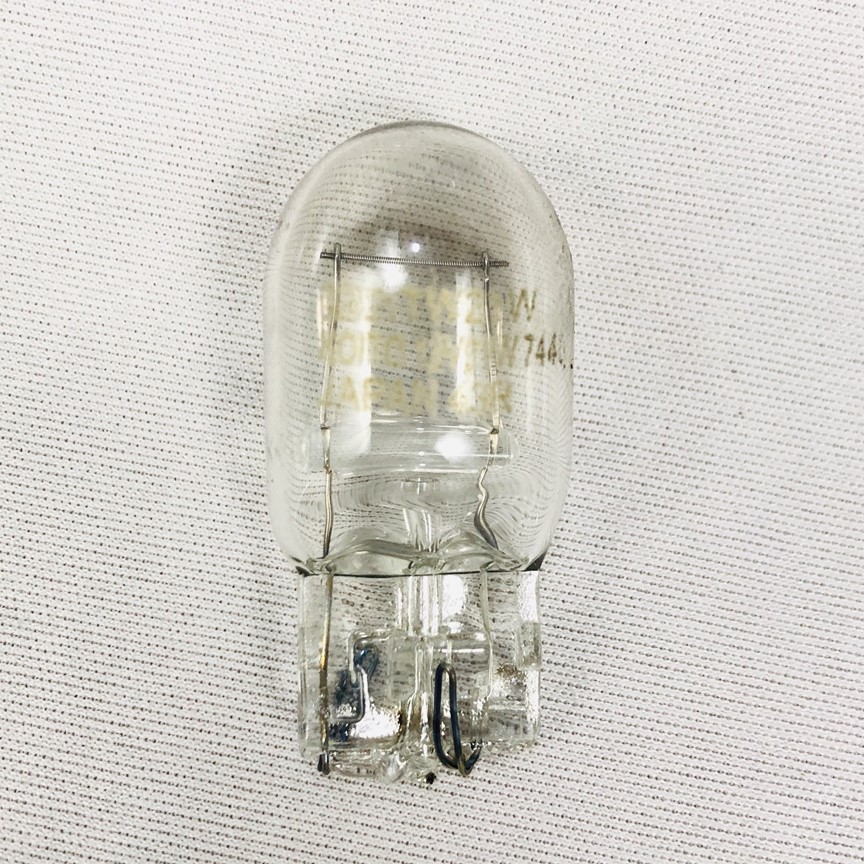 Đèn lùi ô tô chân T20 Halogen KOITO 12V 21W (1 Dây tóc) Green Networks Group