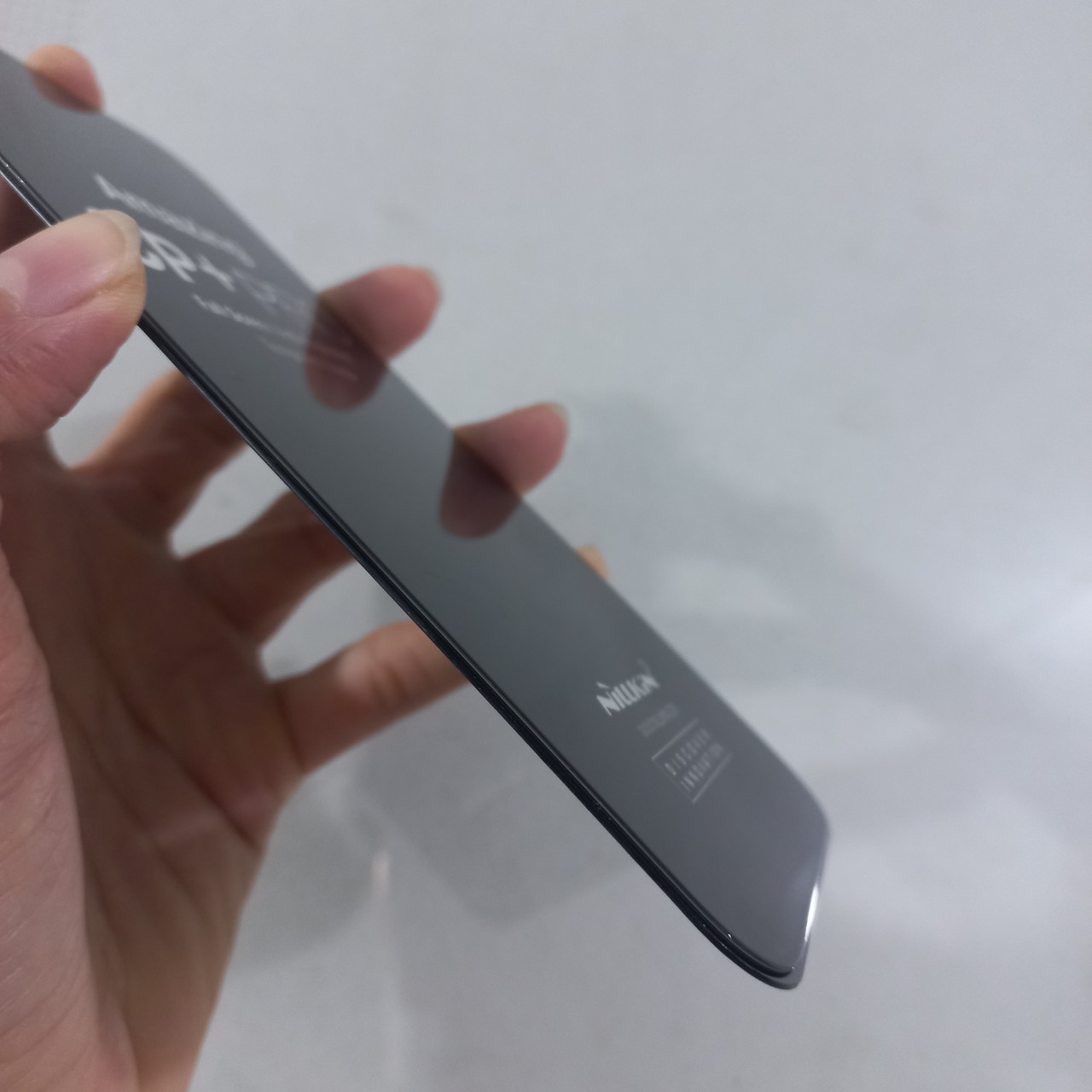 Kính cường lực full màn hình viền đen 0.3mm cho iP 15 Pro Max 6.7inches Nillkin CP+PRO _ hàng chính hãng