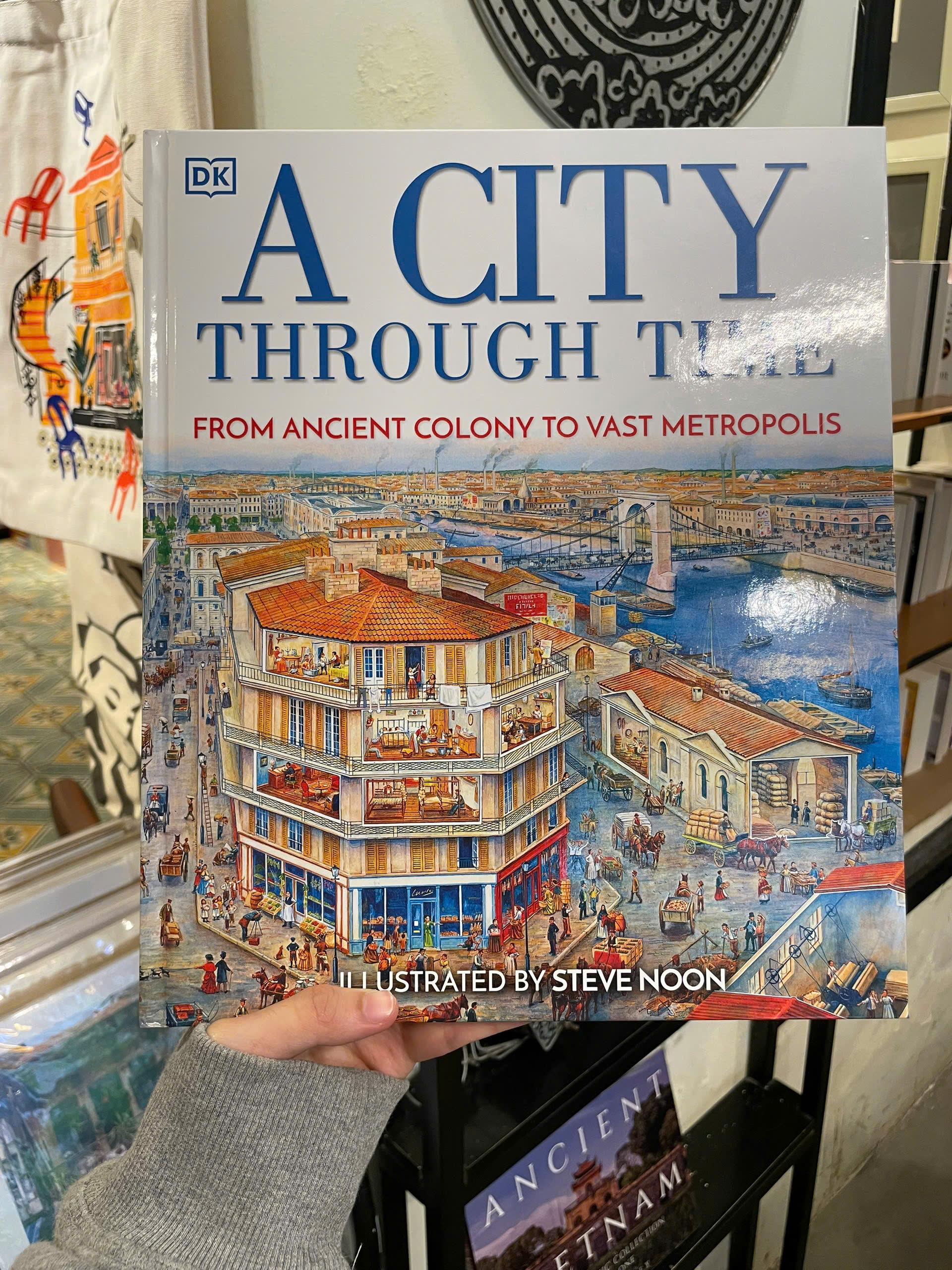 Sách - A City Through Time: From Ancient Colony To Vast Metropolis by Steve Noon - Bìa Cứng