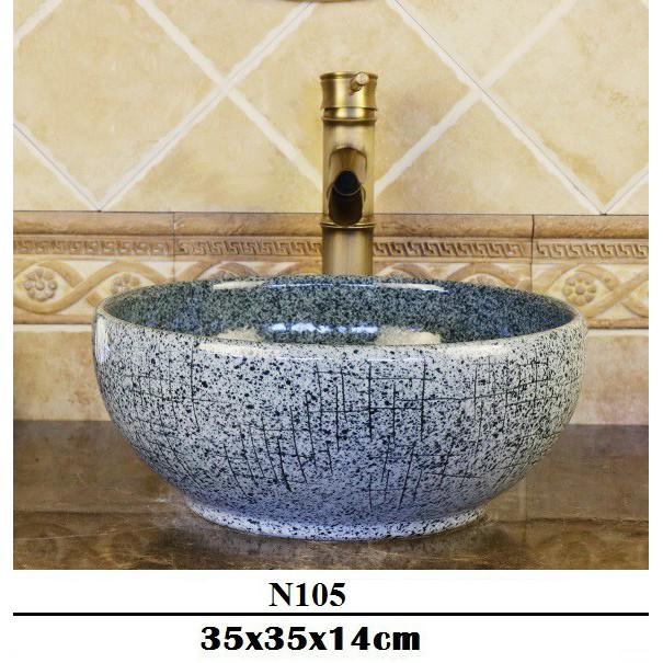 Chậu sứ lavabo nghệ thuật để bàn với tông màu đen huyền bí