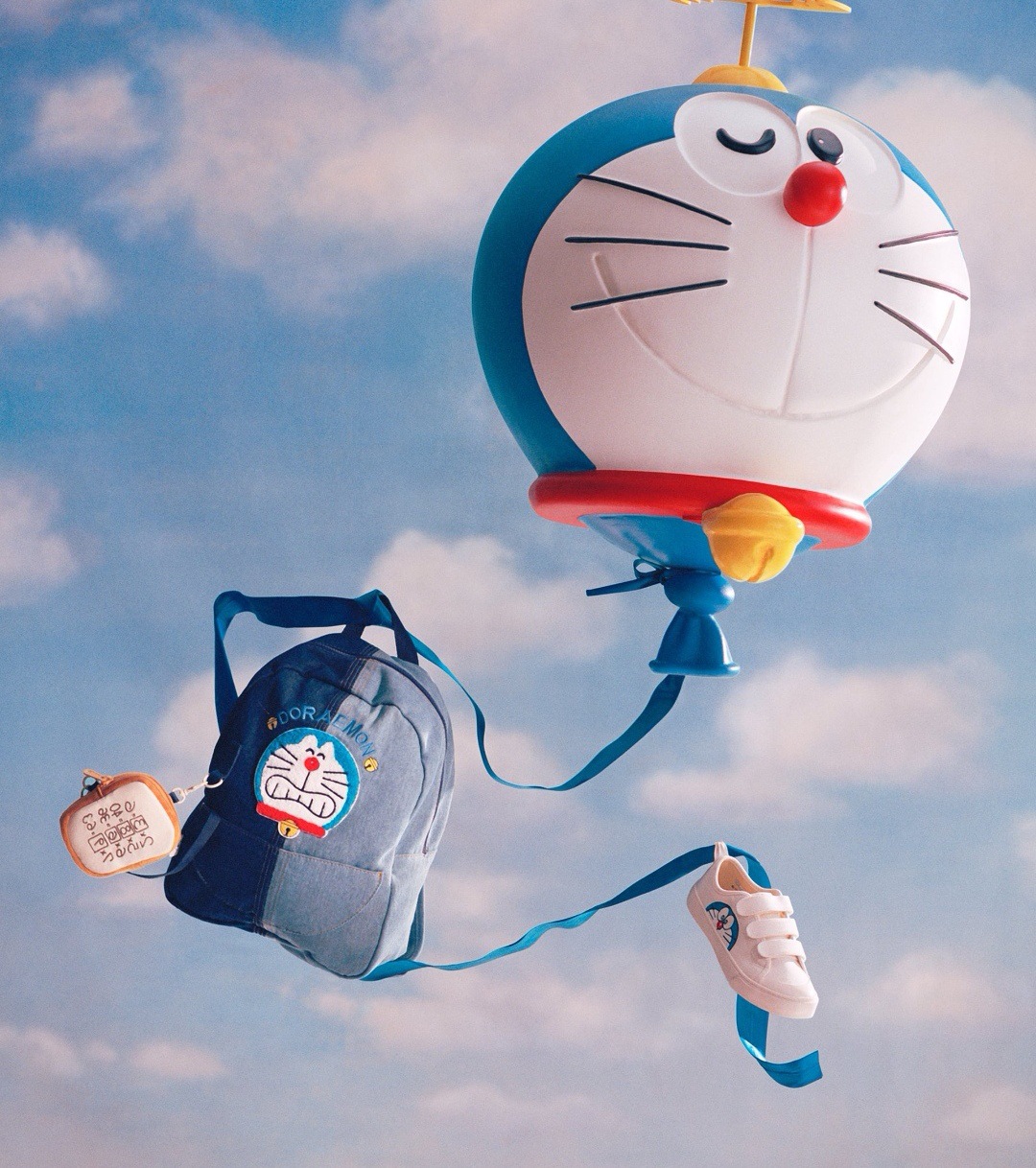 Balo trẻ em doreamon tặng kèm ví bánh mì chuyển ngữ