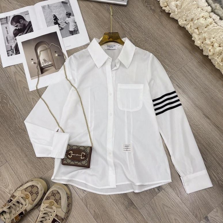 Áo sơ mi nữ trắng dáng công sở viền sọc tay