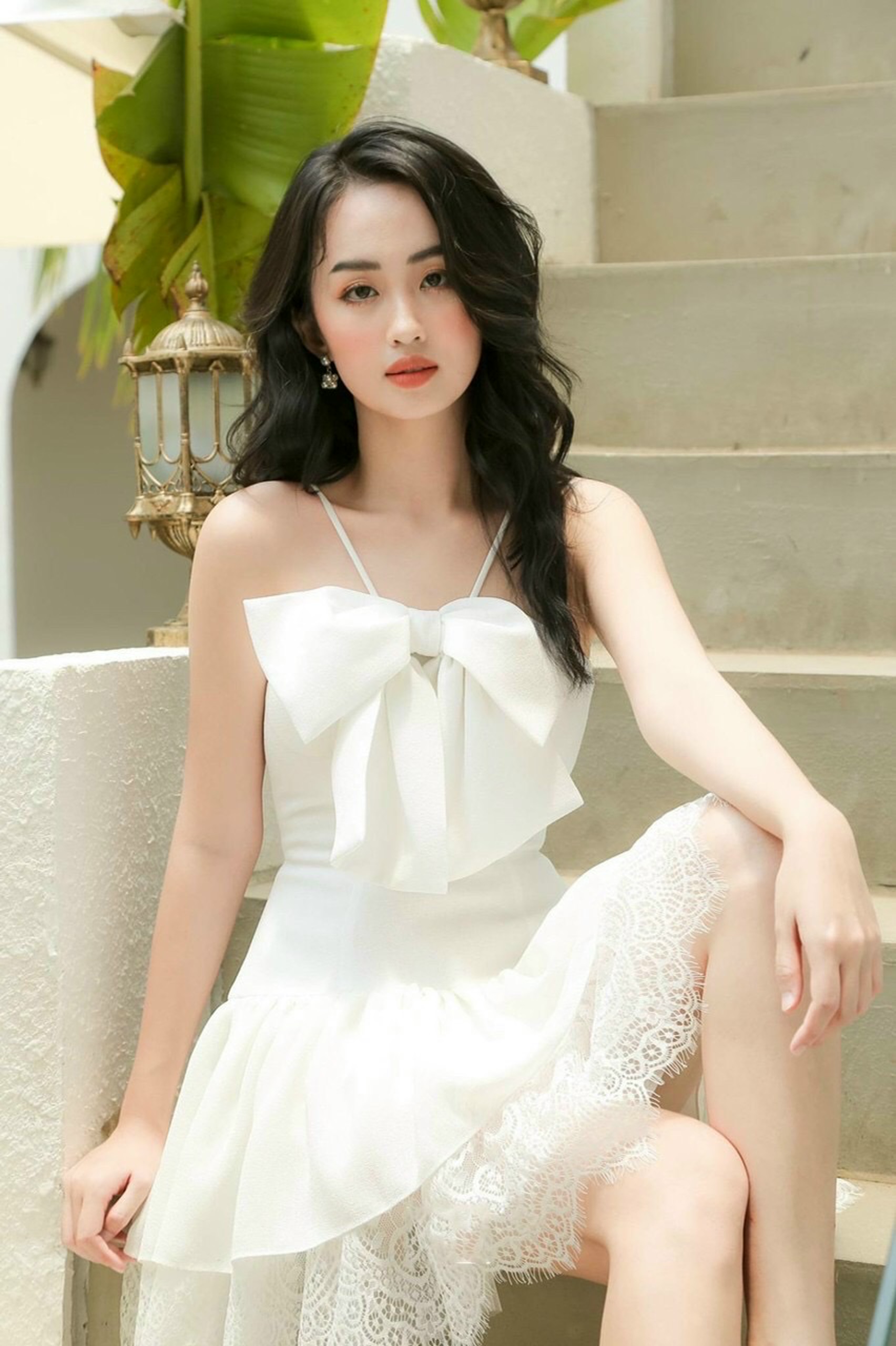 Đầm trắng 2s nơ phối chân ren