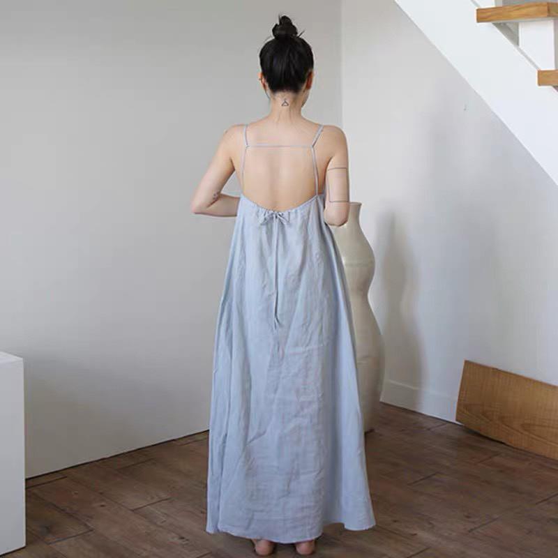 ĐẦM MAXI XANH 2 DÂY CỘT NƠ SAU DÁNG SUÔNG