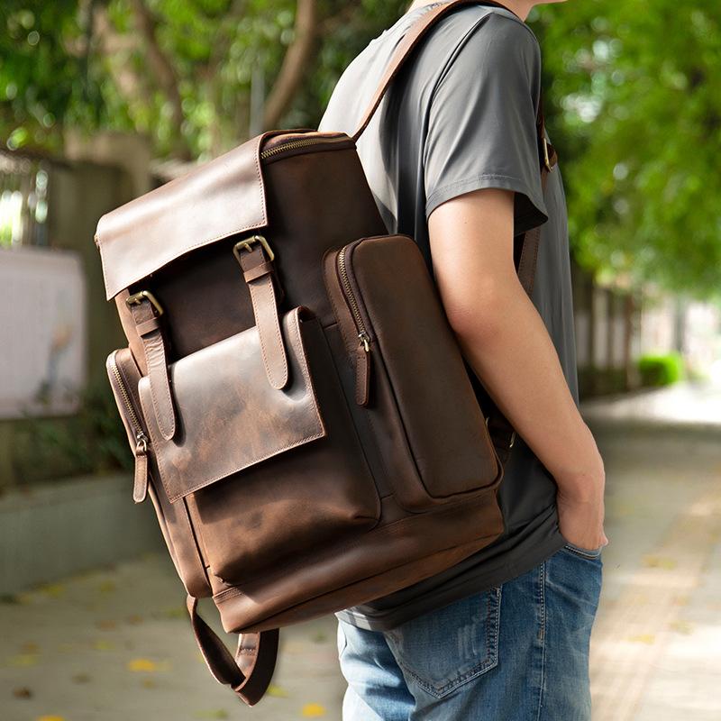 Quảng cáo bánh xe ngựa công suất lớn ngoài trời ba lô da ngựa điên túi nam phong cách cổ điển châu Âu và Mỹ túi đi bộ đường dài và leo núi cặp đi học lớn