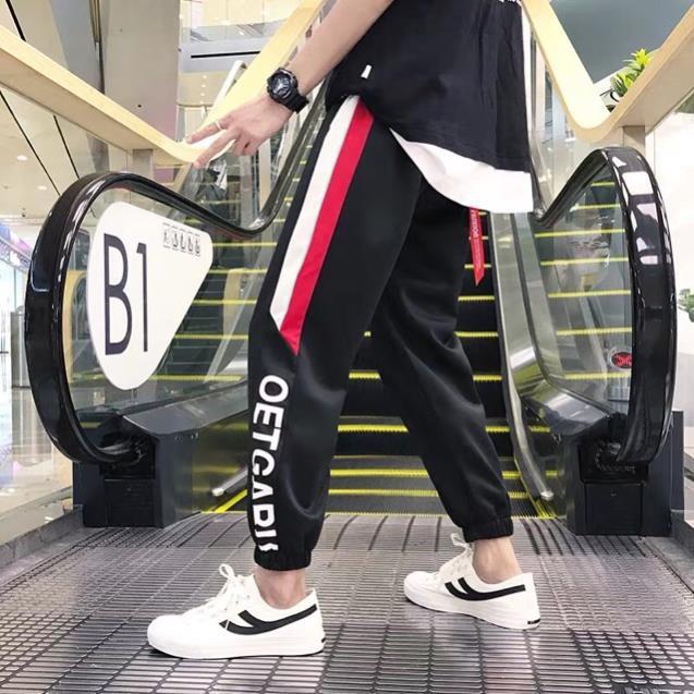 Quần jogger nỉ unisex Đen Chữ Dưới nam nữ phong cách thời trang kim gia