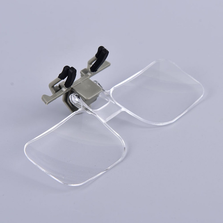 Kính lúp 2X dạng kẹp mắt kính hỗ trợ sửa chữa ( Tặng 01 đèn led mini trợ sáng ngẫu nhiên )