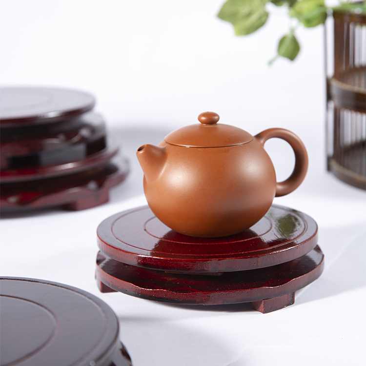 Đế gỗ đặt tượng phật lư hương, ấm trà có thể xoay 360 độ
