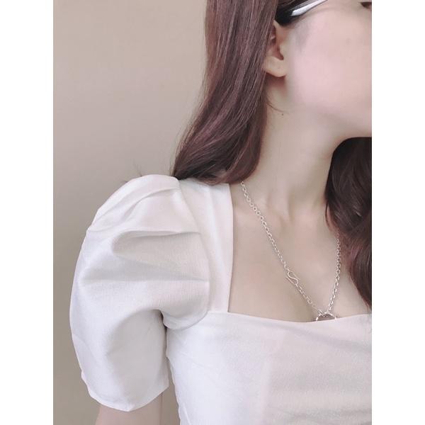 Váy trắng vạt chéo tacta.