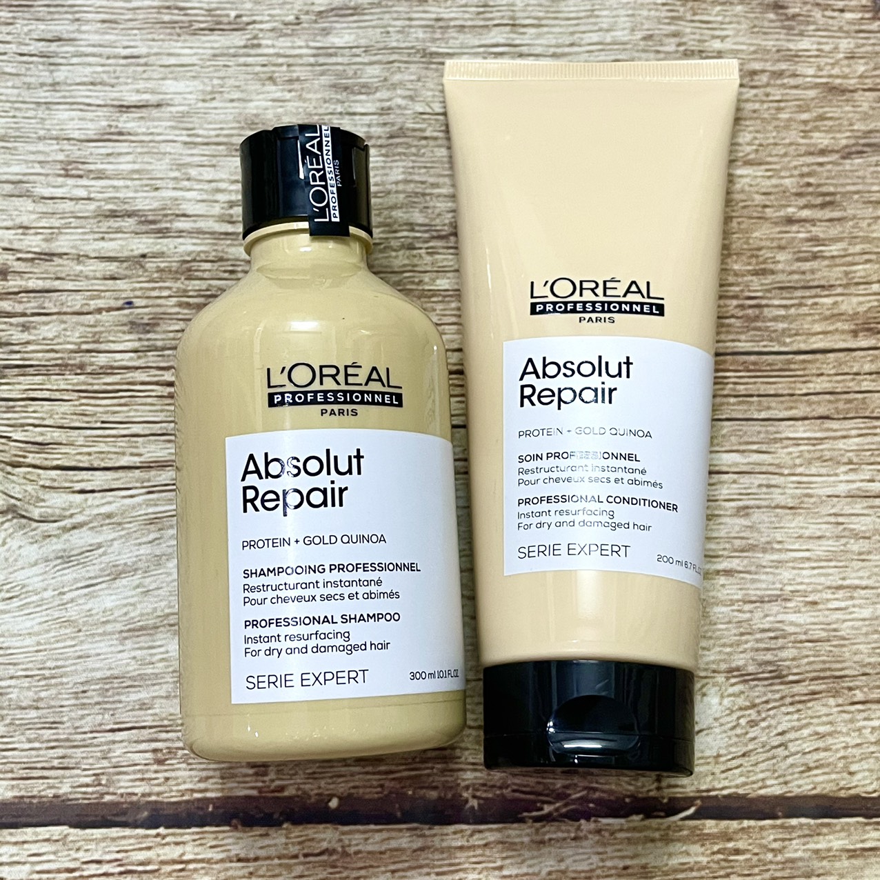 Dầu gội cho tóc hư tổn L'ORÉAL Serie Expert Absolut Repair vàng shampoo 300ml [Mẫu mới]