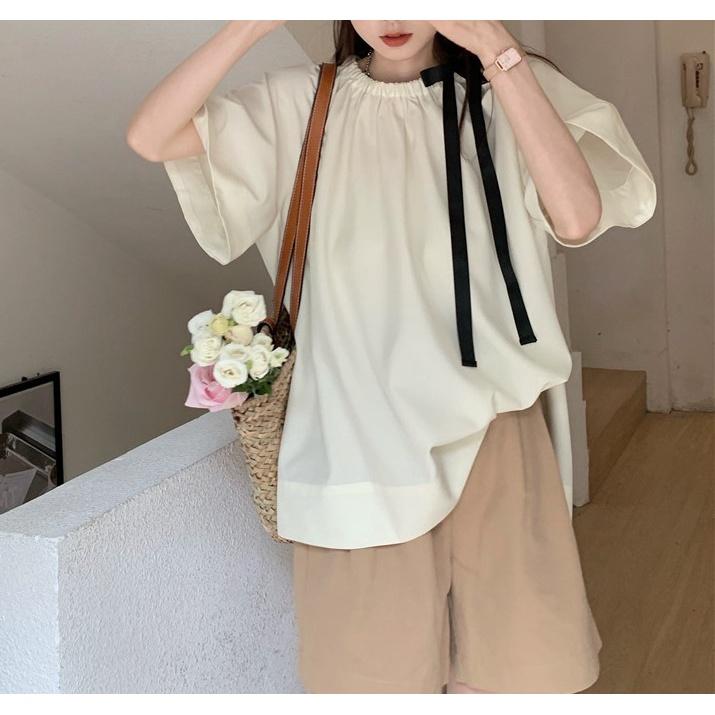 Áo sơ mi tay ngắn cách điệu với phần nơ cột ở cổ, form rộng xinh xắn. Áo bigsize đến 68kg