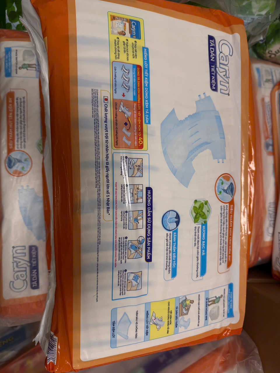 Combo 2 gói tã dán người già Caryn ngày và đêm siêu tiết kiệm gói lớn L18 miếng