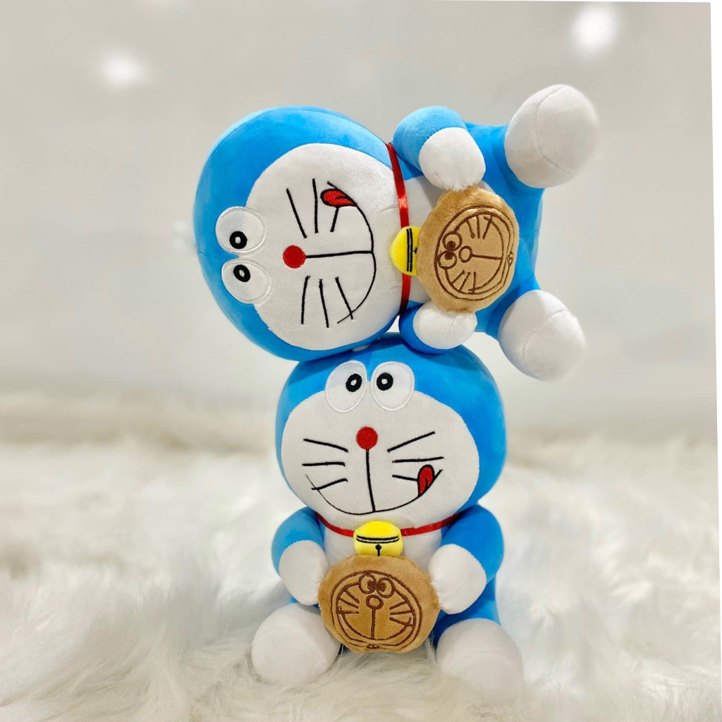 Thú nhồi bông Doraemon ôm bánh rán - Size từ 40cm đến 80cm - Quà tặng gấu bông Doraemon dễ thương