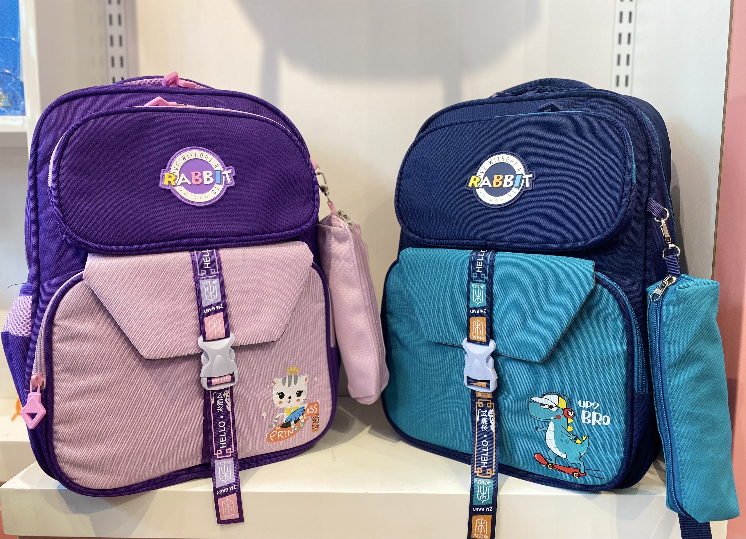 Balo Teen Rabbit hình khủng long màu xanh kèm bóp viết siêu cưng -