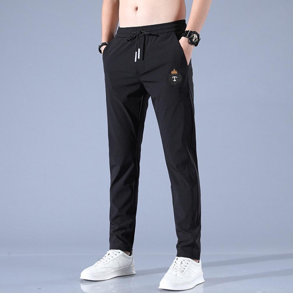 Quần Dài Jogger Nam Ống Côn Phong Cách Hàn Quốc, Chất Vải Si Gió Mềm Mịn, Cạp Chun, Thêu Logo Phong Cách