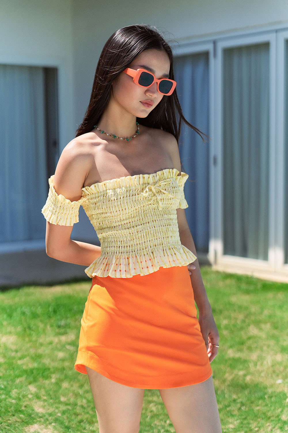 DOTTIE - Chân váy ngắn vạt tròn nữ cam S0127