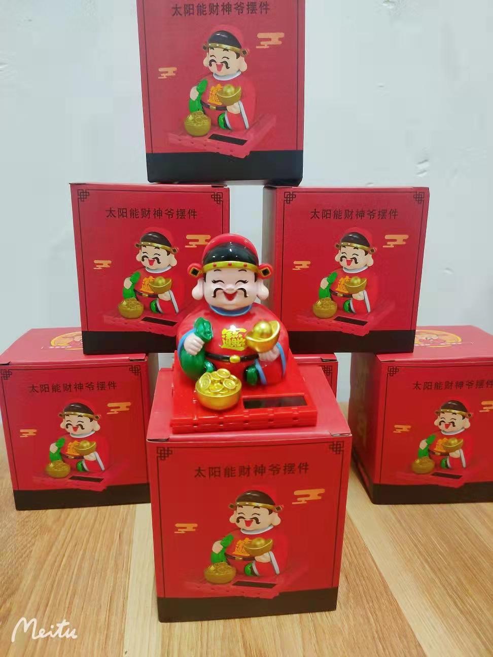 Tượng phật thần tài gật đầu năng lượng