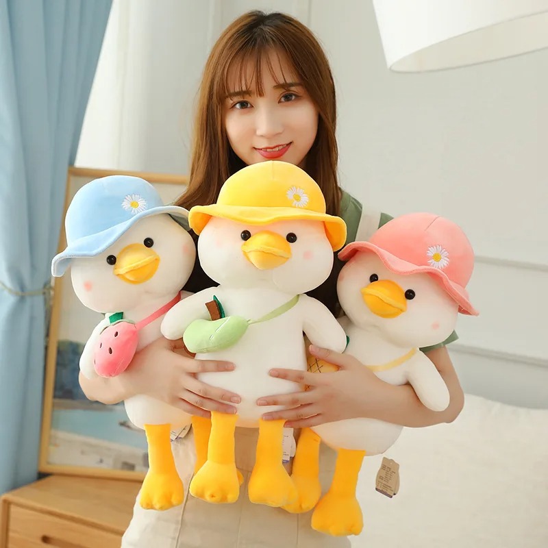 Thú nhồi bông vịt đeo túi đáng yêu - Size 22cm - Quà tặng gấu bông vịt đội nón êm mịn
