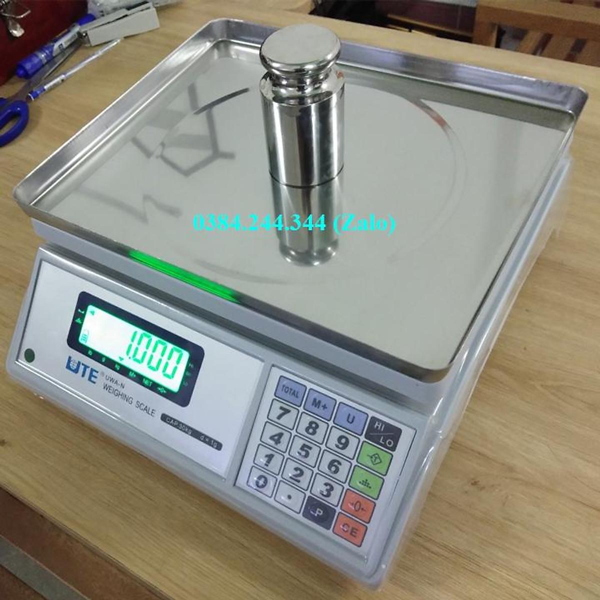 Bộ sản phẩm in tem phiếu khối lượng gồm cân điện tử thông dụng UTE UWA-N mức cân 3kg, độ chia 0.1g và máy in LP50