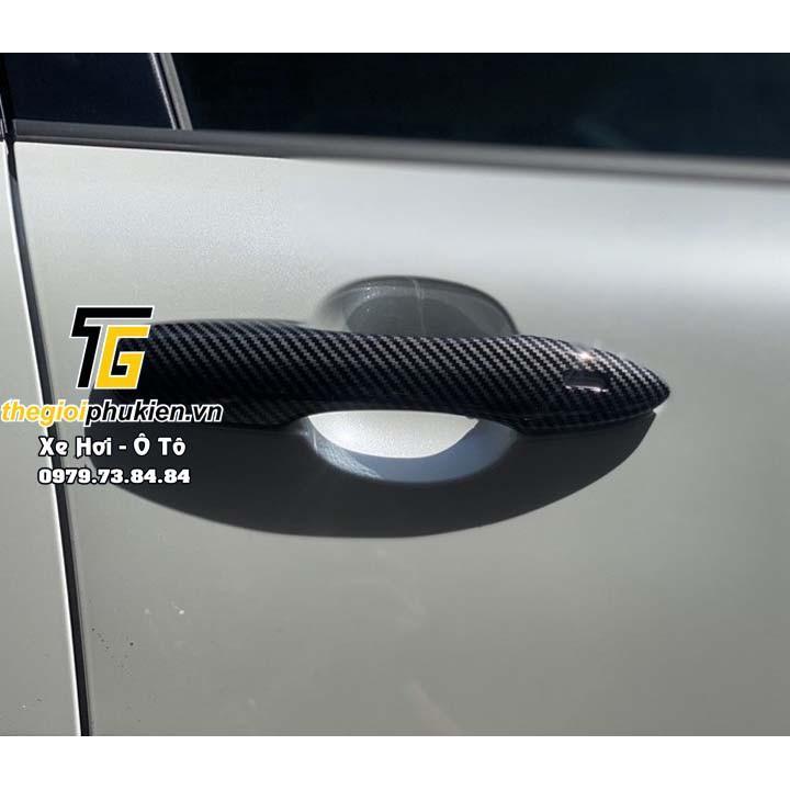 Bộ ốp tay nắm cửa, hõm cửa xe Toyota Corolla Cross 2020 vân Carbon