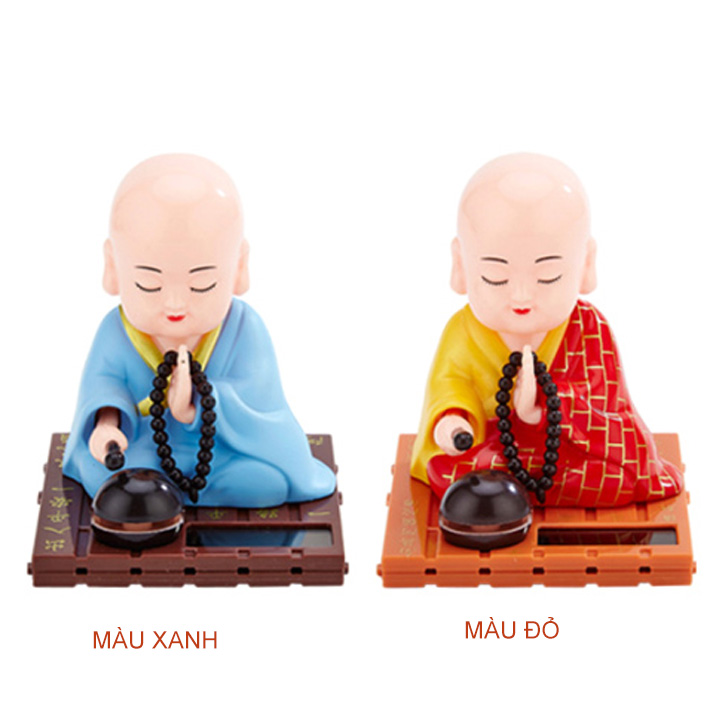 Tượng phật cầu an để trên xe hơi năng lượng mặt trời, tay và đầu tự chuyển động khi có ánh sáng