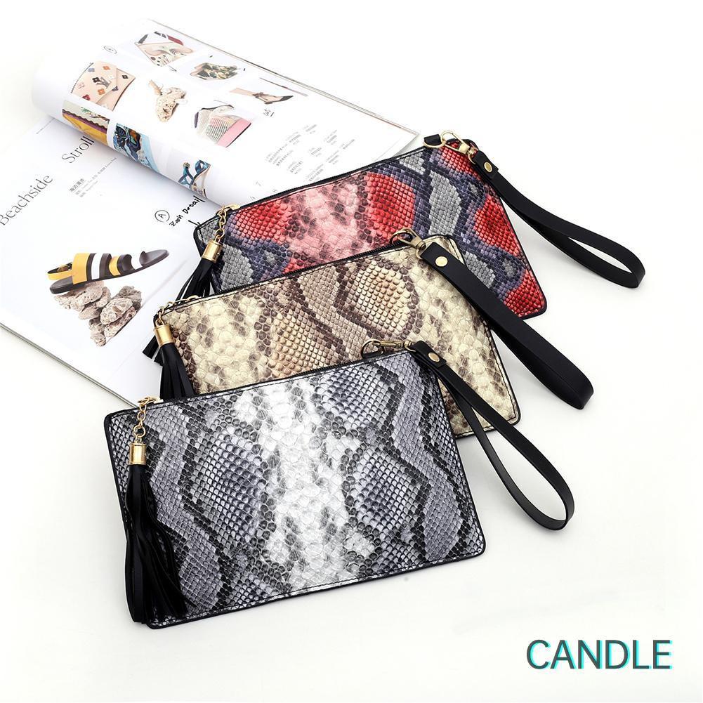 Ví Da Nữ Cầm Tay Có Dây Kéo Tua Rua