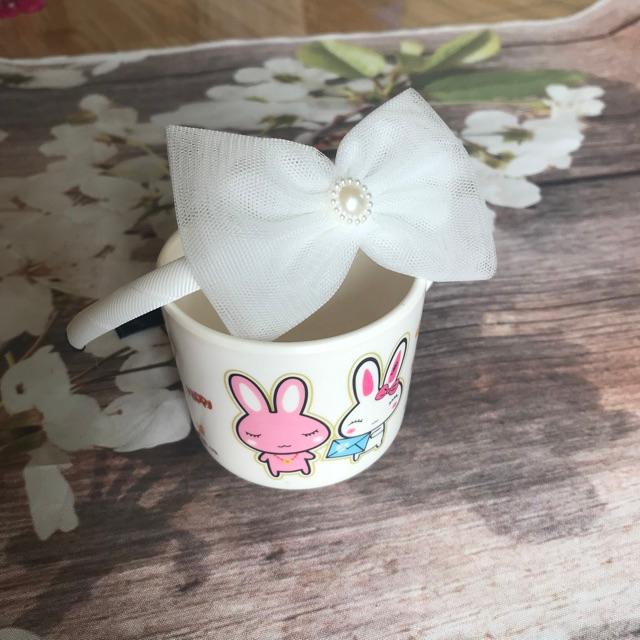 Cài tóc nơ đáng yêu cho bé gái