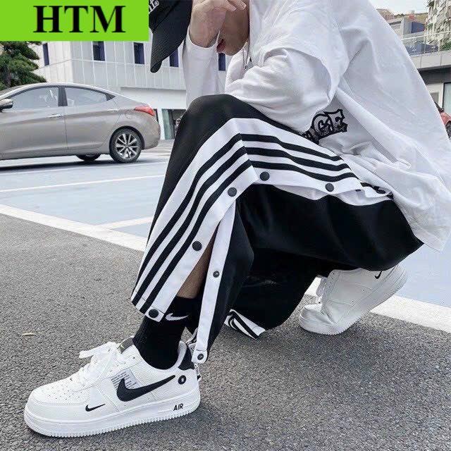 Quần Nam Phối Theo Phong Cách Có Cúc Bấm Xẻ Tà Siêu Ngầu Có Kẻ Sọc HTM FASHION