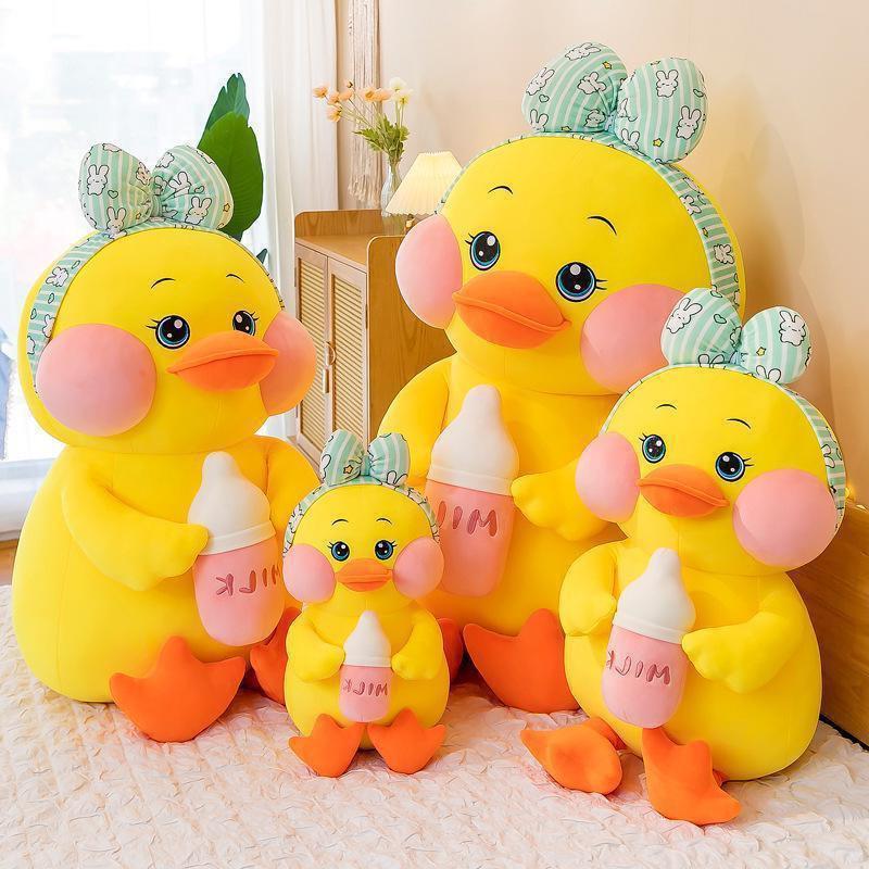 Gấu Bông Vịt Má Hồng, Đội nơ Ôm Bình Sữa Cute kt 45-100cm