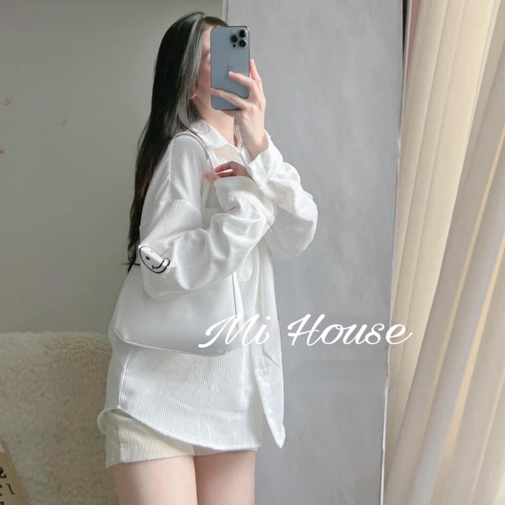 Áo sơ mi trắng nhung hình thêu