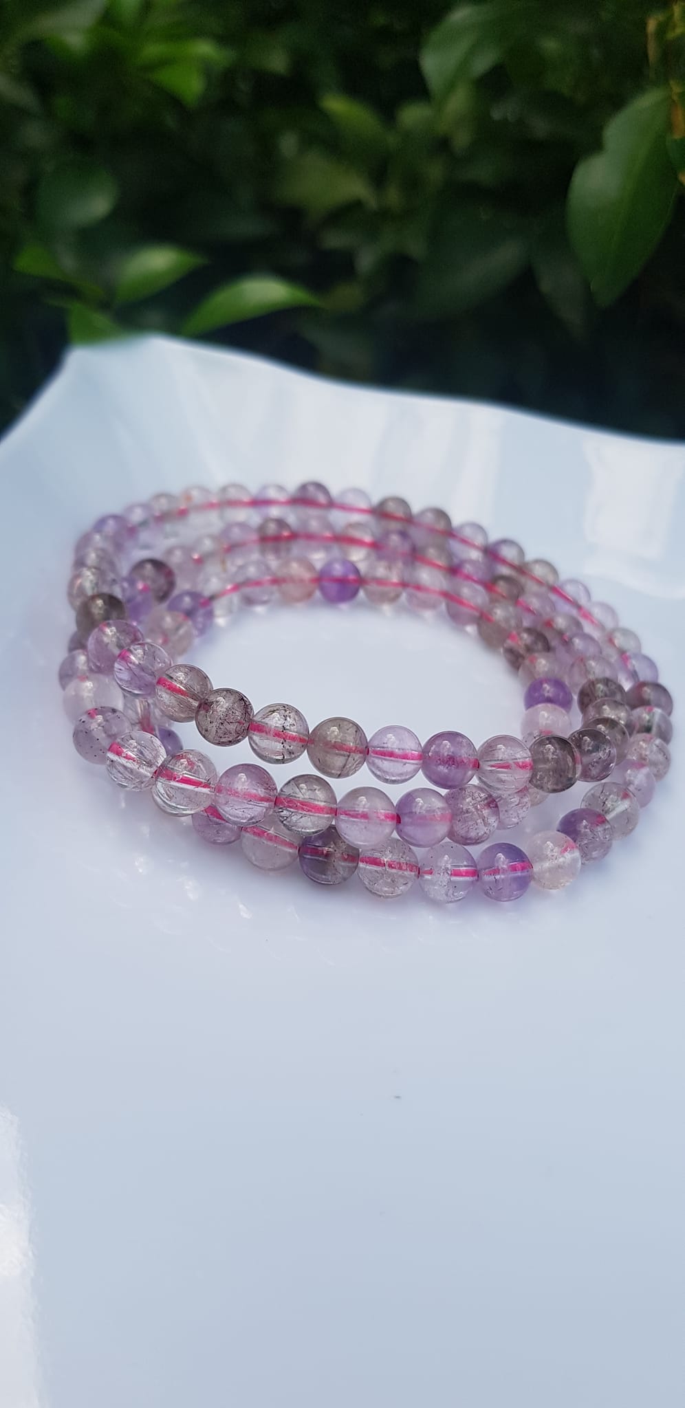 Vòng Tay phong thủy Đá Super Seven tự nhiên bóng đẹp Size vòng hạt 6mm kiểu quấn tay 3 vòng đẹp lắm ạ Super Seven màu tím tím trắng bóng thiệt là đẹp ạ