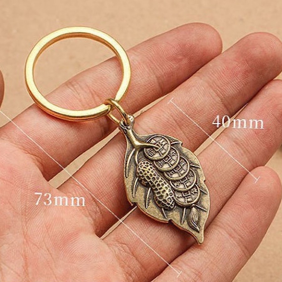 Móc khoá chú bình an 3 món bằng đồng