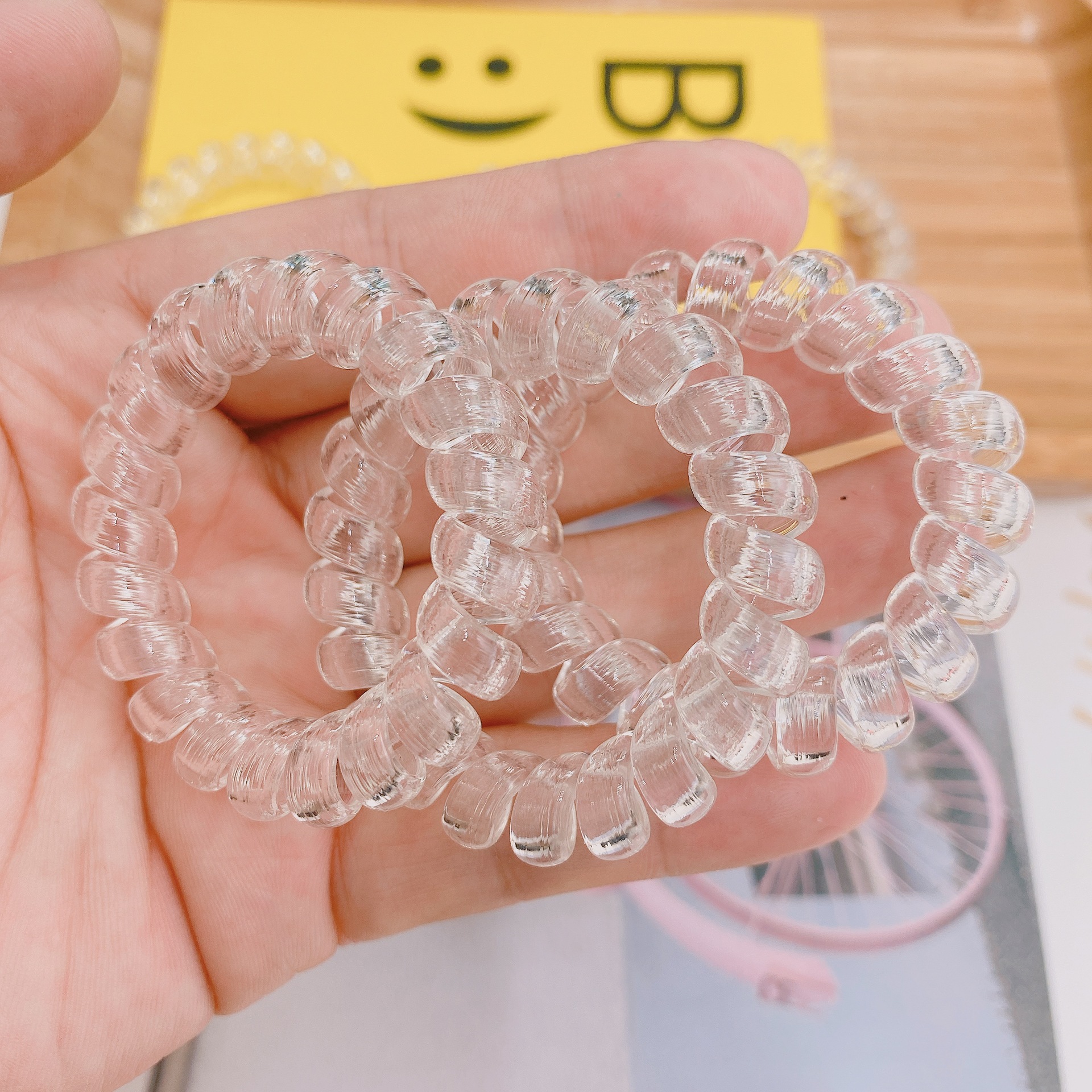 Dây buộc tóc nhựa dạng lò xo xoắn trong suốt gọn gàng dành cho nữ