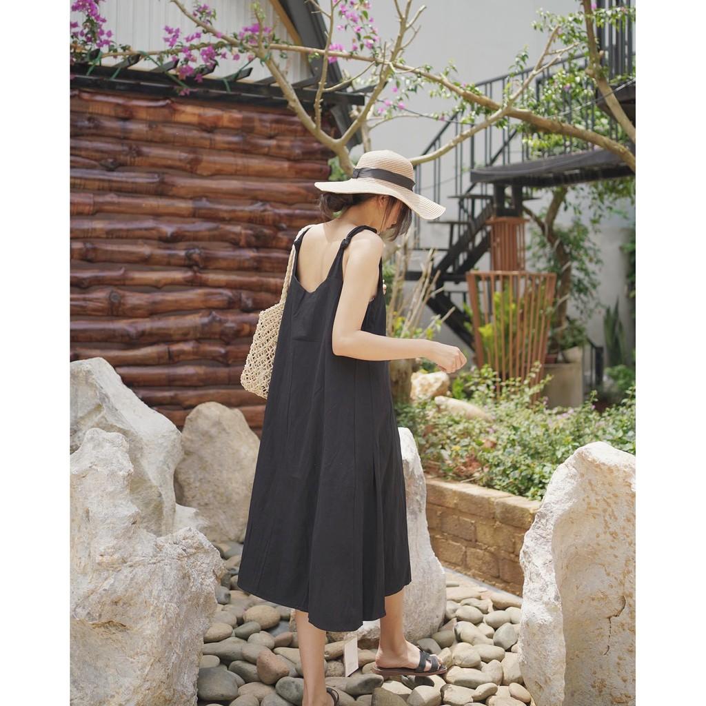 ĐẦM SUÔNG LỤA MAY 2 LỚP TRẮNG ĐEN CỔ TIM
