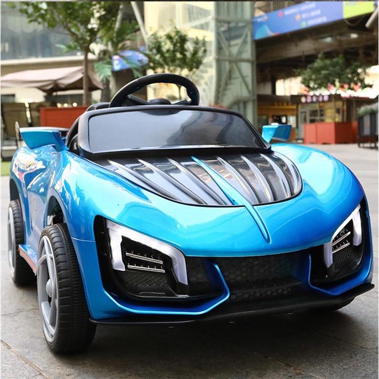 Ô tô xe điện đồ chơi MDX009 cho bé tự lái và điều khiển 2 động cơ