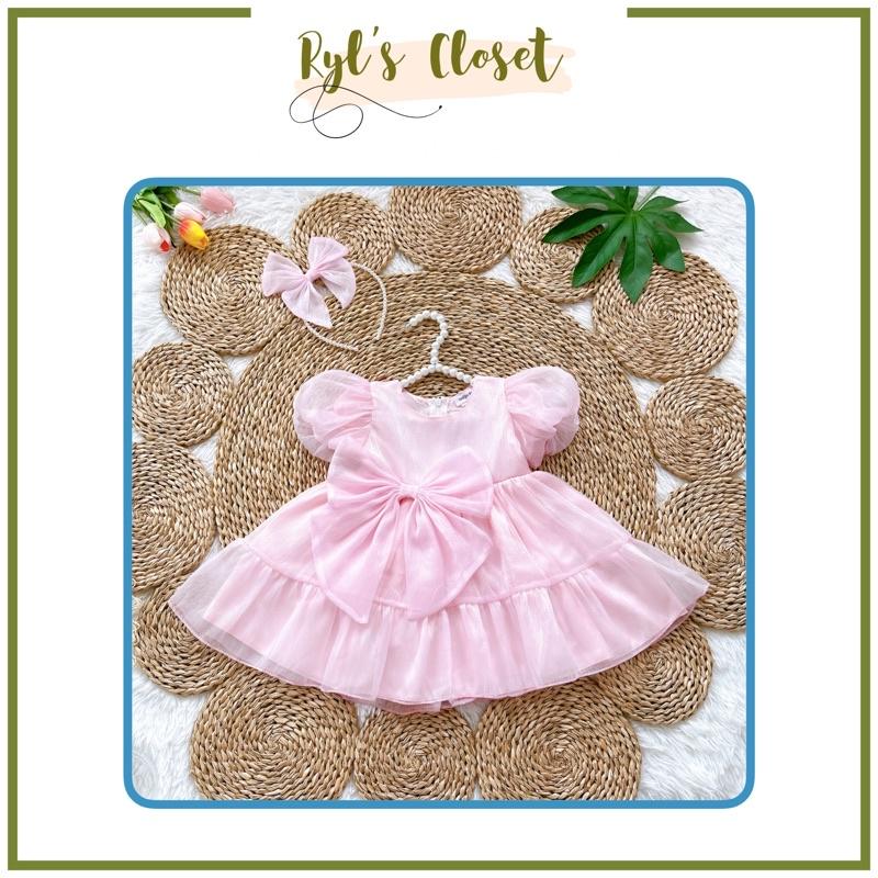 Váy Hồng Phấn Tơ Ánh Nhũ Phối Nơ Bản To Cho Công Chúa