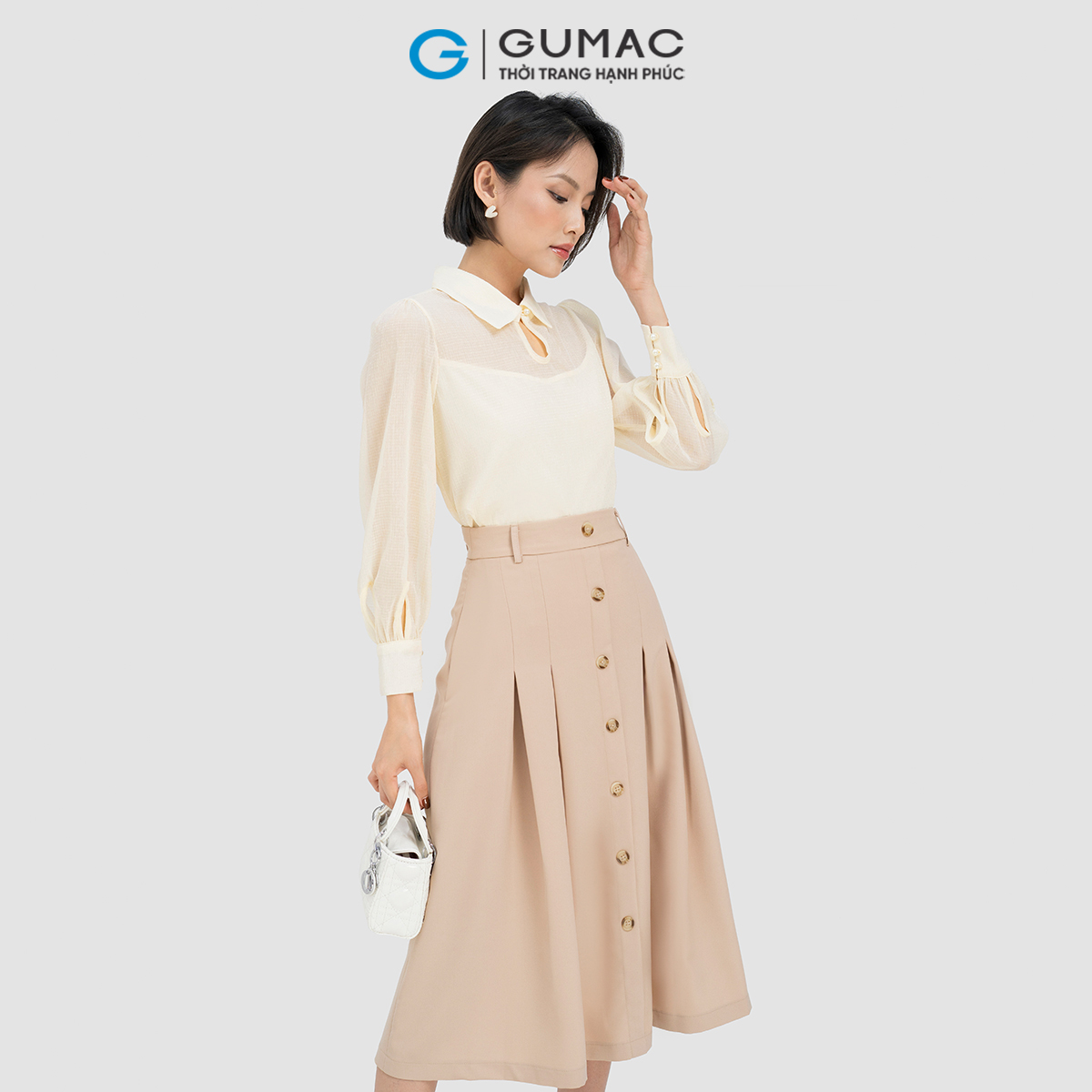 Chân váy A nẹp nút Gumac VD04005