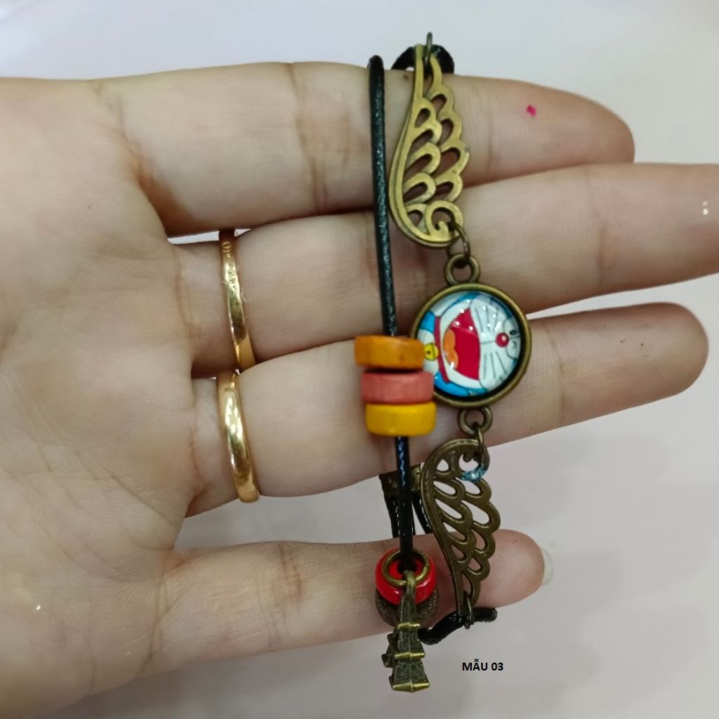 Vòng tay mix kiểu thời trang- Chất liệu: dây dù, dây da, đá, gỗ và kim loại...Mẫu mã đa dạng