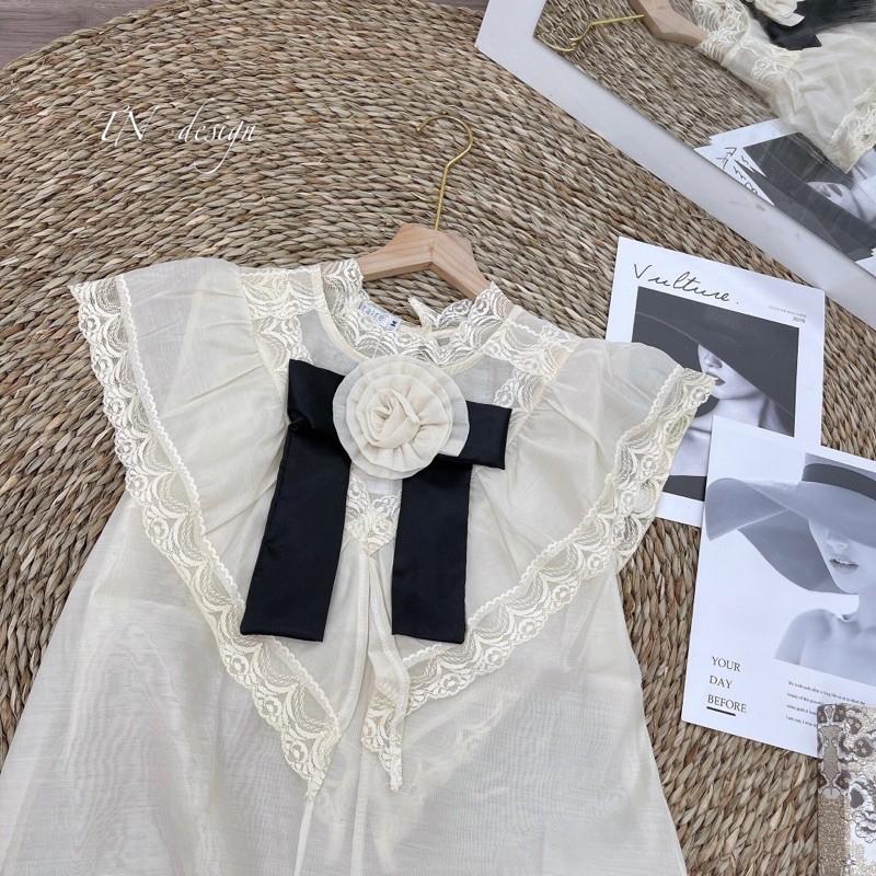 Áo sơmi hoa trà cộc tay