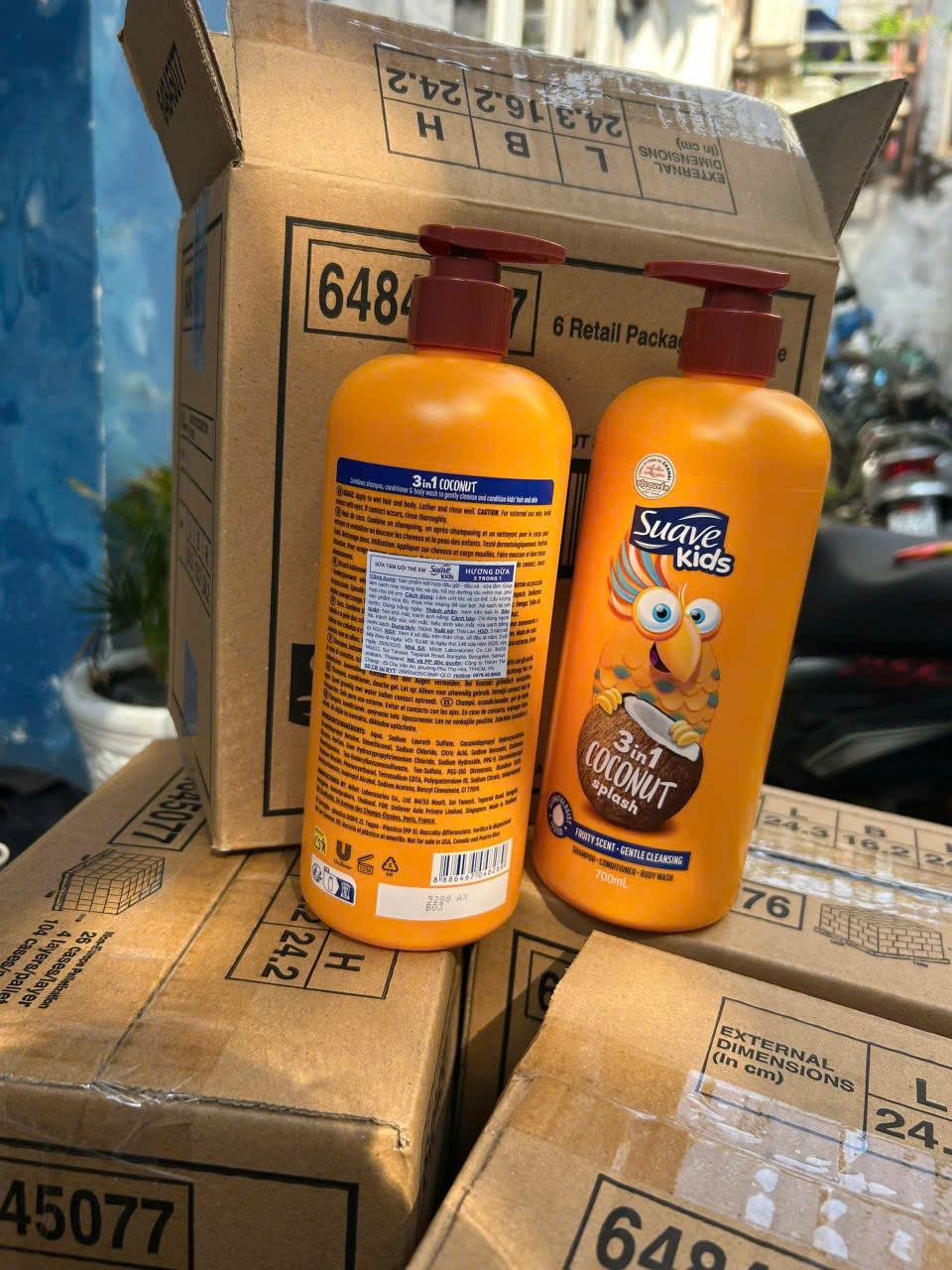 Sữa tắm gội xả 3in1 Suave Kids 700ml hương Dừa màu cam dành cho em bé