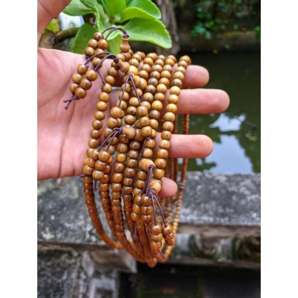 Vòng tay hoa sen nữ chuỗi hạt 5 ly gỗ thơm bach màu tự nhiên