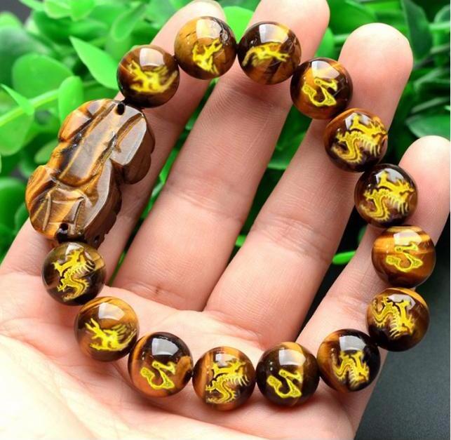 Vòng đeo tay phong thủy đá khắc rồng gắn tỳ hưu