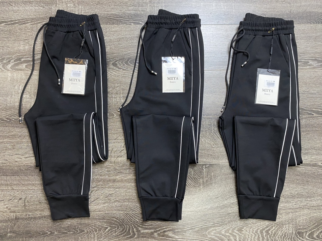Quần jogger nữ Ruby Fashion bo gấu dáng dài cạp chun dây buộc, kiểu sọc nhí 2 bên