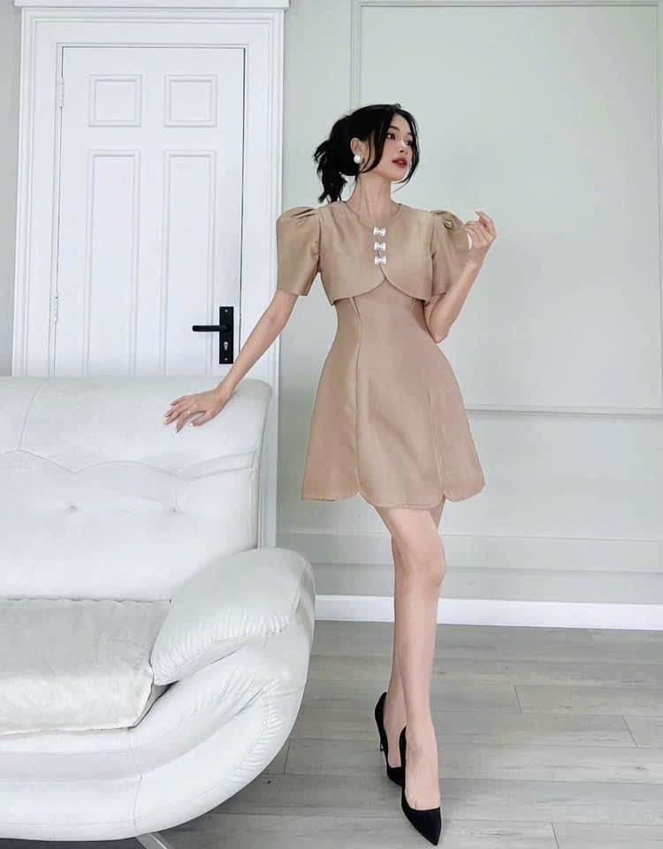 Đầm xoè tafta đắp ngực cài nơ