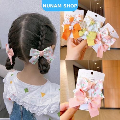 Set 2 kẹp nơ hoa chất vải dày đứng form xinh xắn cho bé Nunam Shop