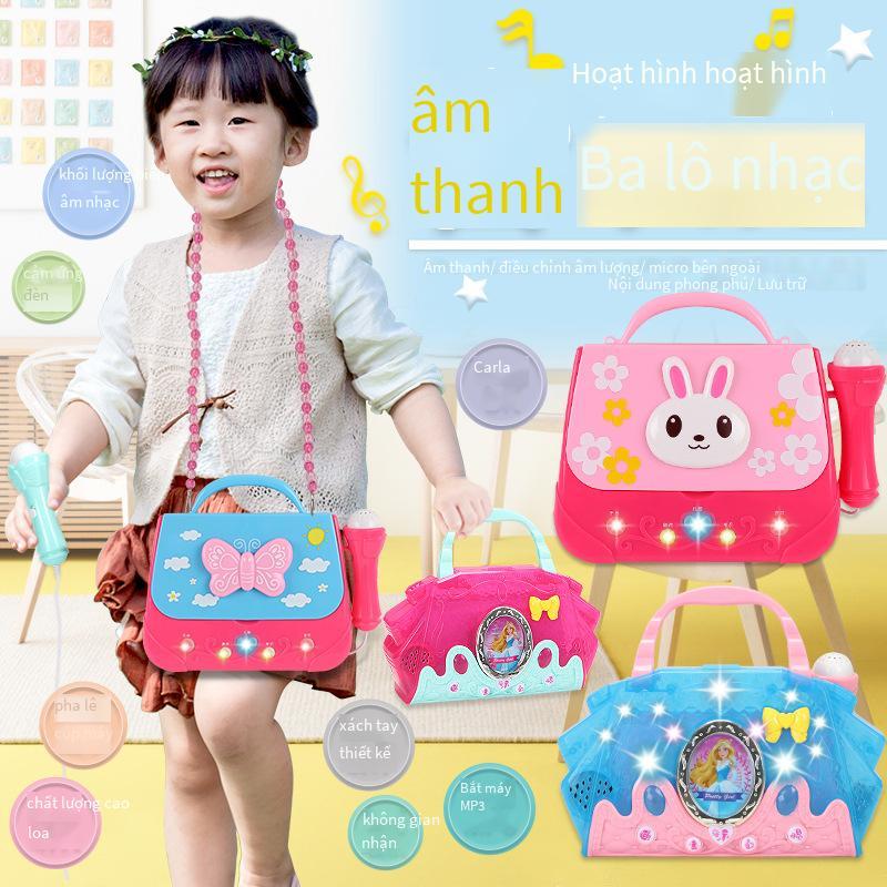 Phong cách mới nhất của trẻ em trí thông minh âm nhạc phim hoạt hình ba lô đồ chơi giáo dục sớm với micrô micrô âm nhạc ánh sáng lưu trữ túi cô gái