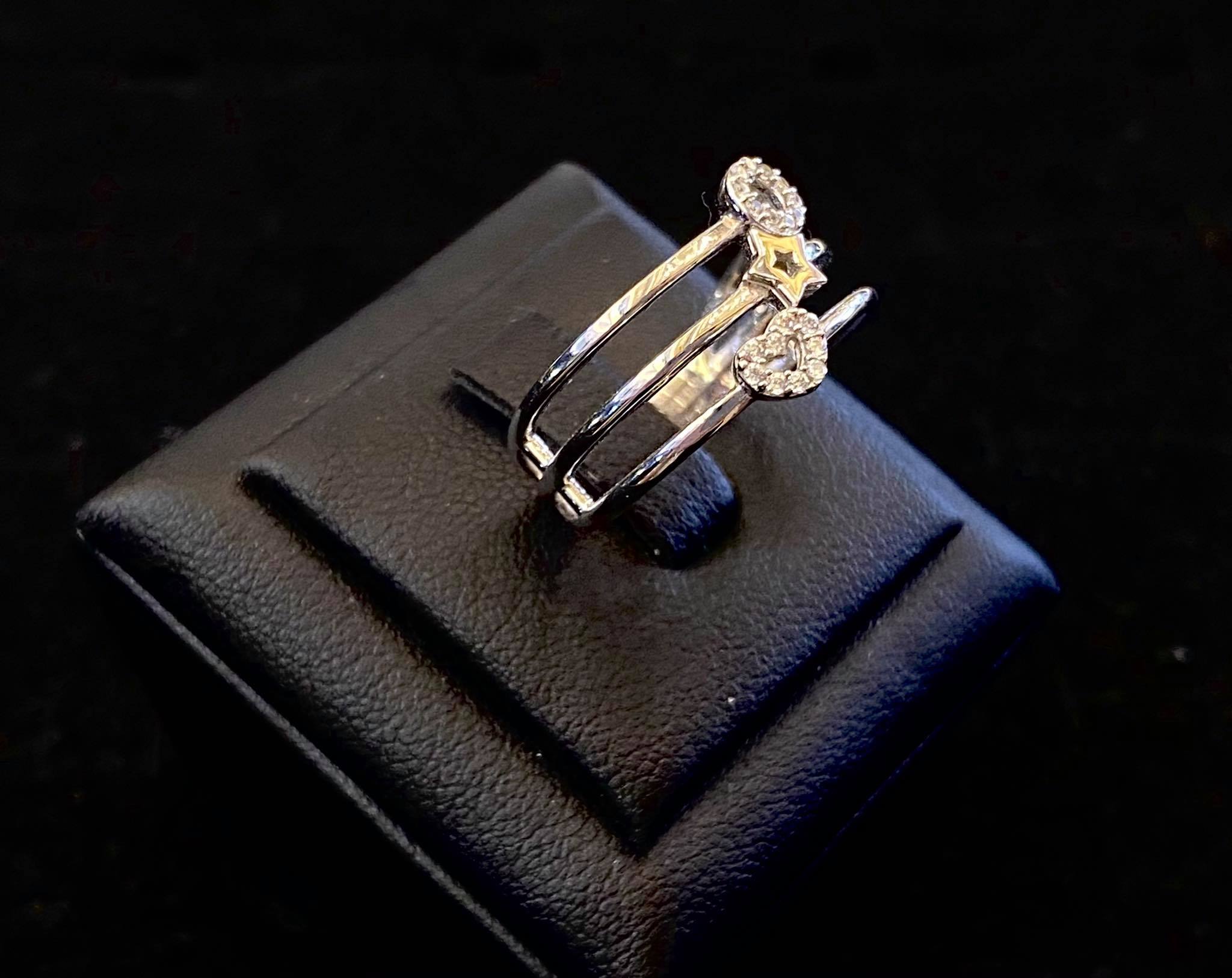 Nhẫn vàng 18k mặt sao trái tim tròn