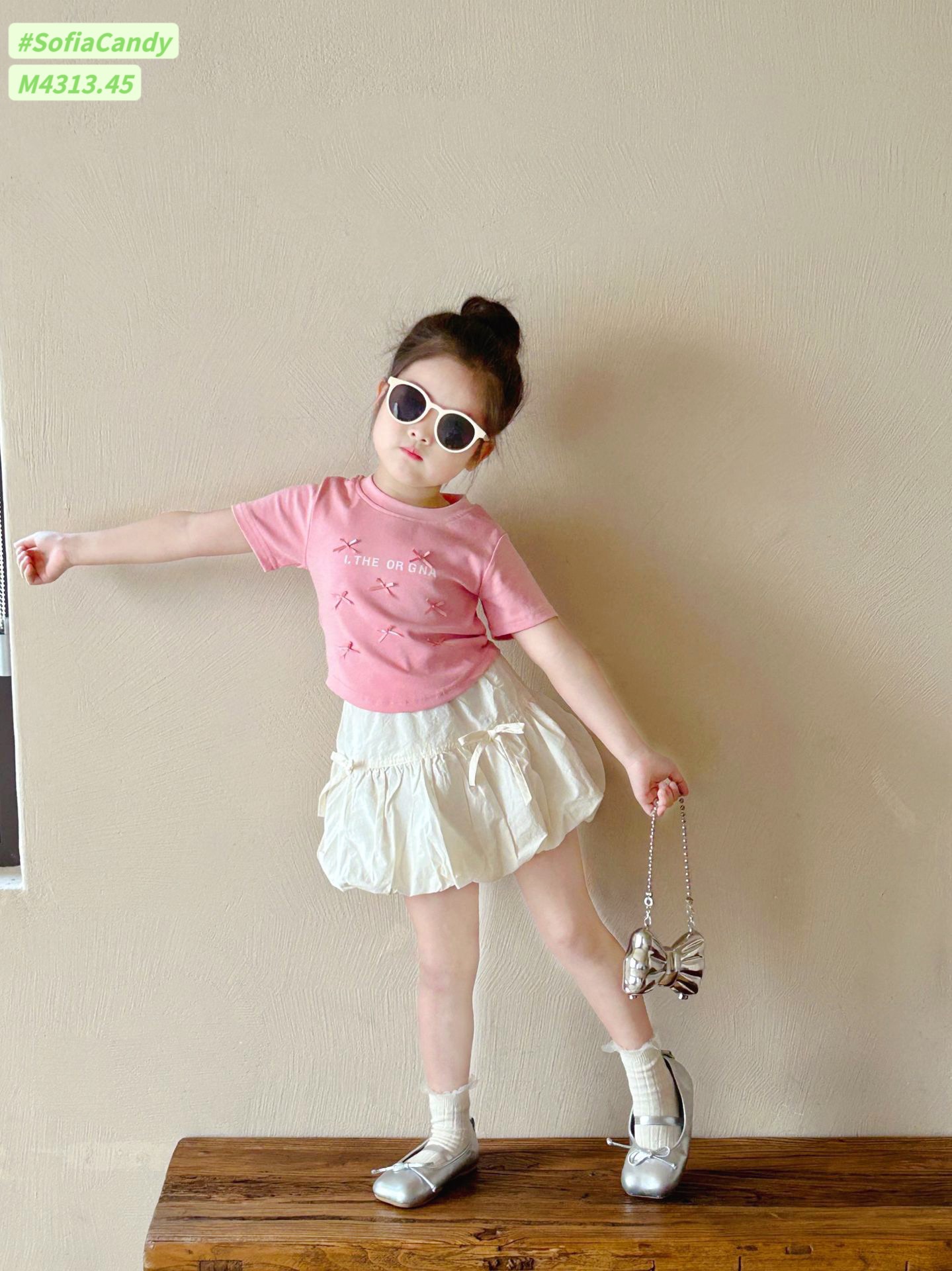 [Từ 1 đến 12 tuổi] Sét áo cotton hồng đính nơ mix chân váy ngắn tơ nhăn mềm (có quần) bé gái đến 45kg