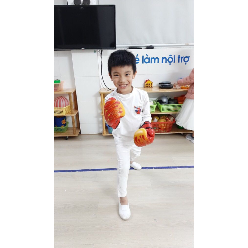 Vỏ bao cát đấm bốc boxing trẻ em 4 lớp dài 60cm, đường kính 26cm tặng full combo 5 món bao gồm găng tay đấm bốc trẻ em, móc treo, dây xích, khuy cài